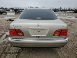 1997 Mercedes-Benz E-Class with VIN WDBJF55F2VJ031344, listed as a Copart auction lot 46499055 with 109,833 mi miles and Clean Title. Bid and sale history available at carsss.com. Image 6.