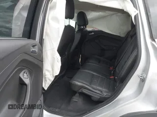 2014 Ford Escape Titanium with VIN 1FMCU9J94EUE51012, listed as a IAAI auction lot 41497105 with 153,031 mi miles. Bid and sale history available at carsss.com. Image 8.