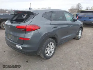2019 Hyundai Tucson SE with VIN KM8J23A48KU923772, listed as a IAAI auction lot 42069850 with 57,692 mi miles. Bid and sale history available at carsss.com. Image 4.
