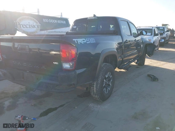 2016 Toyota Tacoma SR5 with VIN 3TMDZ5BN8GM004995, listed as a IAAI auction lot 41979497 with 91,227 mi miles. Bid and sale history available at carsss.com. Image 4.