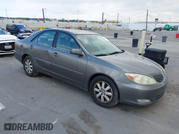 2004 Toyota Camry LE with VIN 4T1BF32K84U588764, listed as a IAAI auction lot 42126345 with 144,642 mi miles. Bid and sale history available at carsss.com. Image 1.