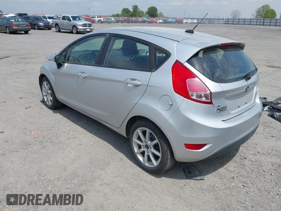 2019 Ford Fiesta SE z VIN 3FADP4EJ9KM107124, wystawiony jako IAAI lot #42067464 z przebiegiem 89 076 mil mil oraz . Historia ofert i sprzedaży dostępna na DreamBid. Obrazek 3.