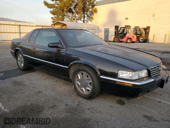 1999 Cadillac Eldorado ESC with VIN 1G6EL12Y8XU614645, listed as a Copart auction lot 86353754 with 151,243 mi miles and Clean Title. Bid and sale history available at DreamBid. Image 4.