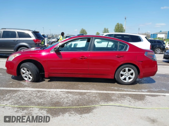 2009 Nissan Altima 2.5 with VIN 1N4AL21E79N467360, listed as a IAAI auction lot 41985550 with 210,485 mi miles. Bid and sale history available at carsss.com. Image 14.