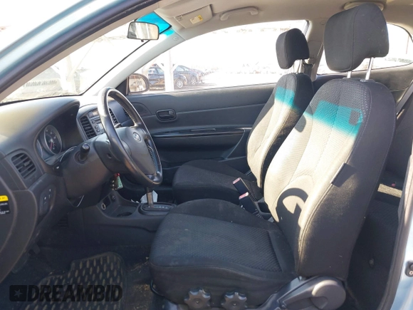 2007 Hyundai Accent SE with VIN KMHCN36CX7U031496, listed as a IAAI auction lot 41811183 with 201,740 mi miles. Bid and sale history available at carsss.com. Image 5.