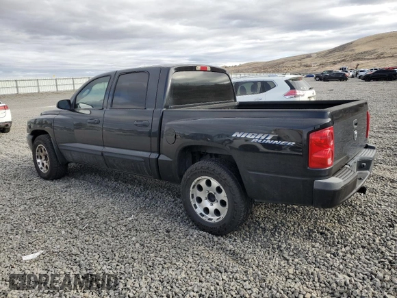 2006 Dodge Dakota SLT with VIN 1D7HW48NX6S665497, listed as a Copart auction lot 47468295 with 215,427 mi miles and Salvage Title. Bid and sale history available at carsss.com. Image 2.