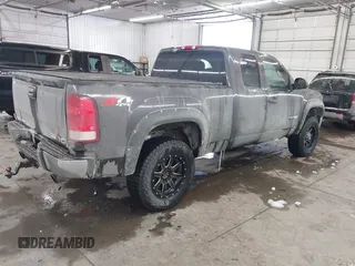 2011 GMC Sierra 1500 SLE z VIN 1GTR2VE32BZ158906, wystawiony jako IAAI lot #41538042 z przebiegiem 169 727 mil mil oraz . Historia ofert i sprzedaży dostępna na DreamBid. Obrazek 4.
