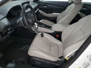 2024 Honda Accord Touring z VIN 1HGCY2F84RA035244, wystawiony jako Copart lot #55990055 z przebiegiem 8 414 mil mil oraz Szkoda całkowita • Salvage title. Historia ofert i sprzedaży dostępna na DreamBid. Obrazek 7.