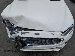 2019 Ford Fusion Titanium с VIN 3FA6P0RU6KR212454, выставлен на аукционе Copart как лот 63137755 с пробегом 30 024 миль миль и Списание • Salvage title. История ставок и продаж доступна на DreamBid. Изображение 11.