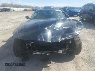 2010 BMW Z4 sDrive30i with VIN WBALM5C57AE162215, listed as a Copart auction lot 49708785 with 0 mi miles and Salvage Title. Bid and sale history available at carsss.com. Image 5.