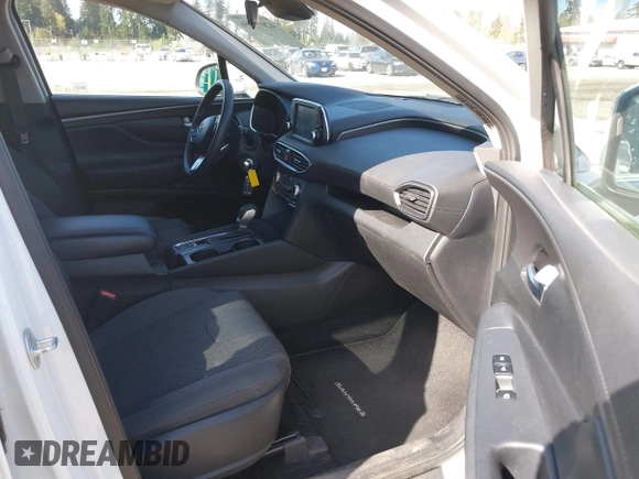 2019 Hyundai Santa Fe SE with VIN 5NMS2CAD0KH098259, listed as a IAAI auction lot 42075356 with 55,163 mi miles and . Bid and sale history available at DreamBid. Image 5.