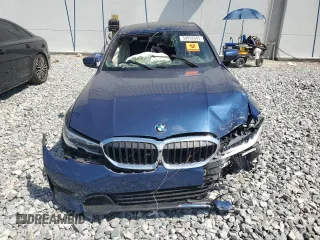 2021 BMW 3 Series 330i with VIN 3MW5R1J06M8B56990, listed as a Copart auction lot 50952045 with 0 mi miles and Clean Title. Bid and sale history available at carsss.com. Image 5.