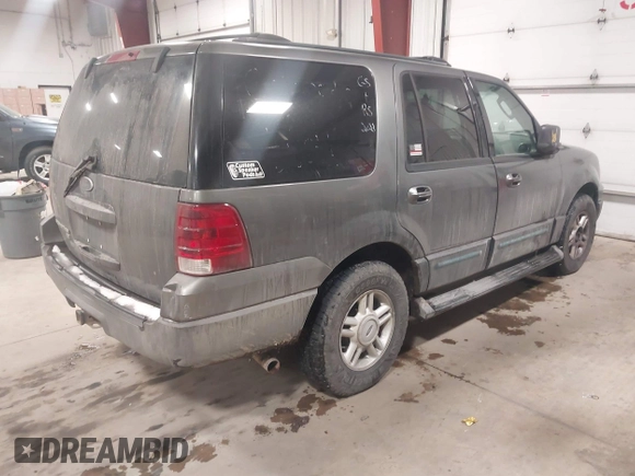 2004 Ford Expedition Special Service with VIN 1FMPU15L74LA92803, listed as a IAAI auction lot 41540002 with 312,510 mi miles. Bid and sale history available at carsss.com. Image 4.