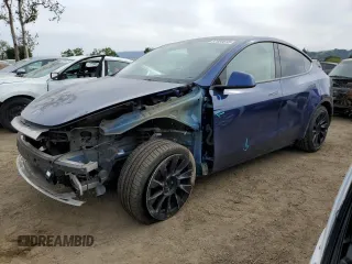 2021 Tesla Model Y Long Range with VIN 5YJYGDEE9MF095417, listed as a Copart auction lot 52960515 with 39,528 mi miles and Salvage Title. Bid and sale history available at DreamBid. Image 1.