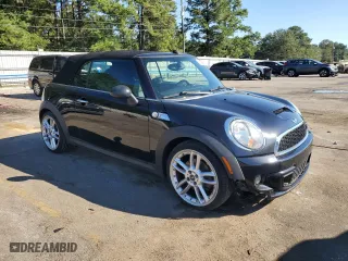 2011 MINI Cooper Convertible s with VIN WMWZP3C58BTX83417, listed as a Copart auction lot 73556814 with 70,130 mi miles and Salvage Title. Bid and sale history available at carsss.com. Image 4.