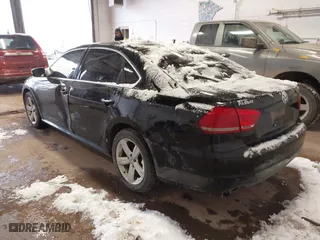 2013 Volkswagen Passat TDI SE with VIN 1VWBN7A39DC003511, listed as a IAAI auction lot 41469644 with 167,962 mi miles. Bid and sale history available at carsss.com. Image 3.