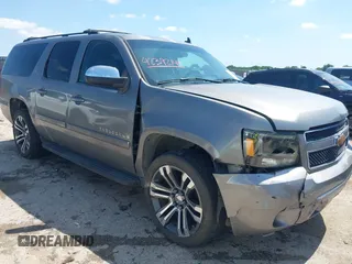 2007 Chevrolet Suburban LT with VIN 1GNFC16JX7J167291, listed as a IAAI auction lot 42392149 with 214,400 mi miles and . Bid and sale history available at DreamBid. Image 1.