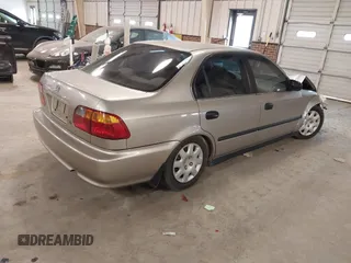 2000 Honda Civic LX with VIN 1HGEJ6578YL042505, listed as a IAAI auction lot 41331854 with 226,727 mi miles. Bid and sale history available at carsss.com. Image 4.