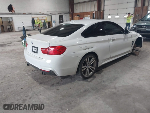 2014 BMW 4 Series 435i xDrive with VIN WBA3R5C54EK186187, listed as a IAAI auction lot 42248064 with 73,532 mi miles and . Bid and sale history available at DreamBid. Image 4.