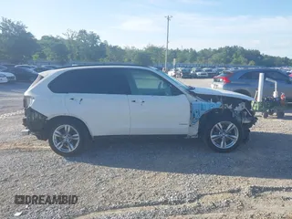 2015 BMW X5 xDrive35i z VIN 5UXKR0C5XF0P00041, wystawiony jako IAAI lot #42291641 z przebiegiem 73 109 mil mil oraz . Historia ofert i sprzedaży dostępna na DreamBid. Obrazek 14.