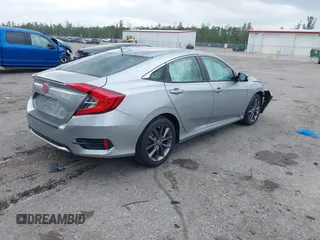 2021 Honda Civic Sedan EX-L with VIN 19XFC1F77ME008461, listed as a IAAI auction lot 41920231 with 31,912 mi miles. Bid and sale history available at carsss.com. Image 4.