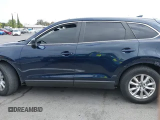 2016 Mazda CX-9 Sport with VIN JM3TCABY3G0123239, listed as a IAAI auction lot 42570700 with 119,414 mi miles and . Bid and sale history available at DreamBid. Image 15.