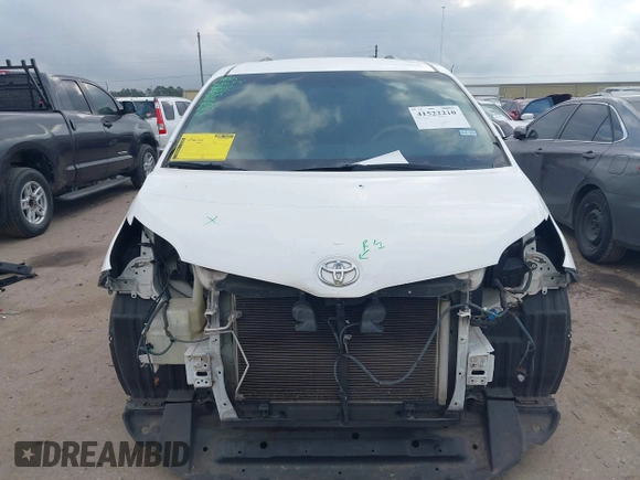 2014 Toyota Sienna LE AAS with VIN 5TDKK3DC6ES526159, listed as a IAAI auction lot 41522210 with 123,563 mi miles and . Bid and sale history available at DreamBid. Image 6.