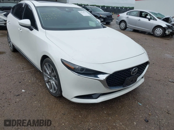 2023 Mazda 3 S Premium with VIN 3MZBPBDM6PM371326, listed as a IAAI auction lot 42138373 with 24,865 mi miles and . Bid and sale history available at DreamBid. Image 1.