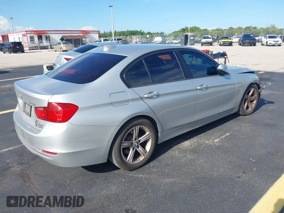2015 BMW 3 Series 320i with VIN WBA3B1G53FNT05936, listed as a IAAI auction lot 42591667 with 143,594 mi miles and . Bid and sale history available at DreamBid. Image 4.