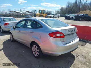2013 Ford Fiesta SE with VIN 3FADP4BJ2DM173456, listed as a IAAI auction lot 41785902 with 87,004 mi miles. Bid and sale history available at carsss.com. Image 3.