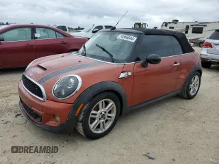 2014 MINI Convertible S with VIN WMWZP3C51ET707557, listed as a Copart auction lot 74566644 with 58,628 mi miles and Salvage Title. Bid and sale history available at DreamBid. Image 1.
