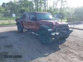 2021 Jeep Gladiator Mojave with VIN 1C6JJTEG8ML592381, listed as a IAAI auction lot 42369581 with 75,295 mi miles and . Bid and sale history available at DreamBid. Image 1.