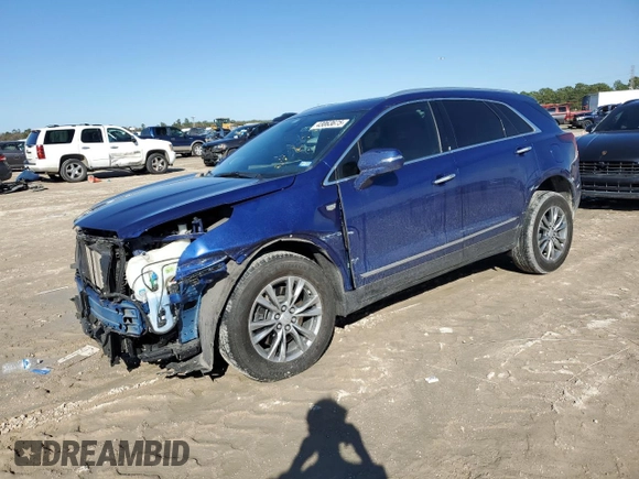 2023 Cadillac XT5 FWD Premium Luxury with VIN 1GYKNCRS3PZ154122, listed as a Copart auction lot 43063675 with 52,279 mi miles and Salvage Title. Bid and sale history available at carsss.com. Image 1.
