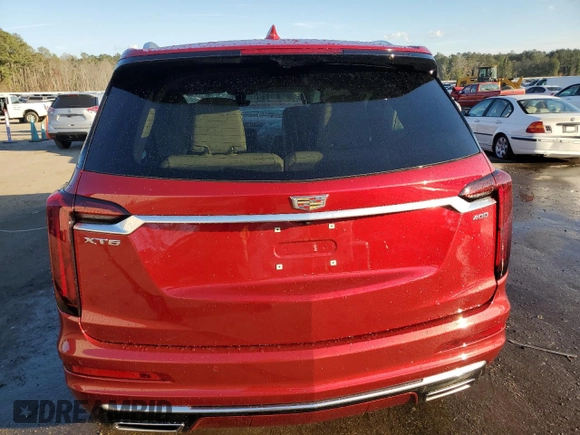 2024 Cadillac XT6 FWD Premium Luxury with VIN 1GYKPCRS6RZ708900, listed as a Copart auction lot 83399314 with 16,591 mi miles and Salvage Title. Bid and sale history available at carsss.com. Image 6.