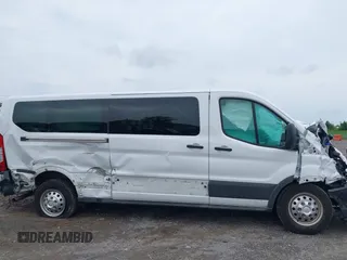 2023 Ford Transit Passenger XL with VIN 1FBAX9Y83PKC08567, listed as a IAAI auction lot 39883261 with 15,028 mi miles and . Bid and sale history available at DreamBid. Image 13.