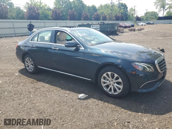 2017 Mercedes-Benz E 300 Luxury with VIN WDDZF4KBXHA185598, listed as a Copart auction lot 61011935 with 59,116 mi miles and Salvage title. Bid and sale history available at DreamBid. Image 4.