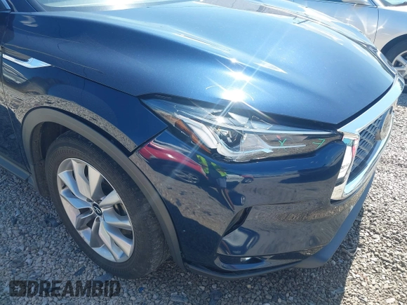 2022 Infiniti QX50 Luxe z VIN 3PCAJ5BA9NF108288, wystawiony jako IAAI lot #42646497 z przebiegiem 65 145 mil mil oraz . Historia ofert i sprzedaży dostępna na DreamBid. Obrazek 17.