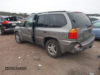 2008 GMC Envoy SLE1 with VIN 1GKDS13S682205759, listed as a IAAI auction lot 41378668 with 234,582 mi miles and . Bid and sale history available at DreamBid. Image 3.