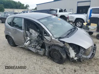 2009 Honda Fit with VIN JHMGE88249S025083, listed as a Copart auction lot 58121945 with Not provided miles and Salvage title. Bid and sale history available at DreamBid. Image 4.