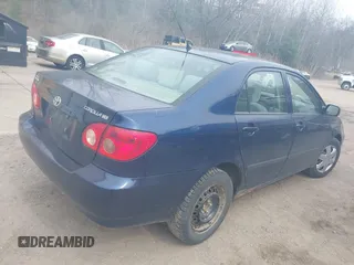 2008 Toyota Corolla CE with VIN 1NXBR32E98Z997007, listed as a IAAI auction lot 42090245 with 115,384 mi miles. Bid and sale history available at carsss.com. Image 4.