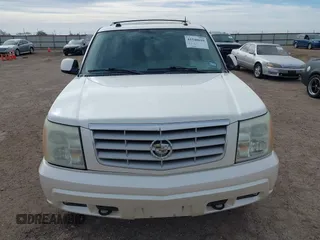 2005 Cadillac Escalade z VIN 1GYEC63T05R133618, wystawiony jako IAAI lot #41540610 z przebiegiem 212 947 mil mil oraz . Historia ofert i sprzedaży dostępna na DreamBid. Obrazek 6.