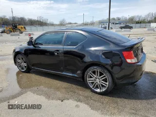 2012 Scion tC z VIN JTKJF5C76C3034769, wystawiony jako Copart lot #52517495 z przebiegiem 205 501 mil mil oraz Nie do naprawy. Historia ofert i sprzedaży dostępna na DreamBid. Obrazek 2.