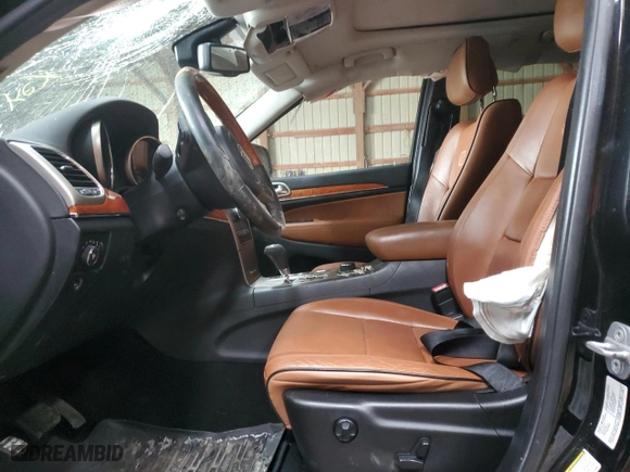 2012 Jeep Grand Cherokee Overland with VIN 1C4RJFCT2CC318931, listed as a Copart auction lot 47194825 with 65,165 mi miles and Salvage Title. Bid and sale history available at carsss.com. Image 7.