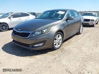 2013 Kia Optima LX with VIN 5XXGM4A74DG093454, listed as a IAAI auction lot 42004990 with 176,667 mi miles. Bid and sale history available at carsss.com. Image 2.