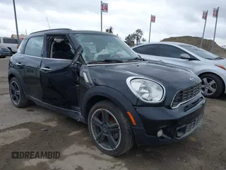 2013 MINI Countryman S with VIN WMWZC3C57DWP22928, listed as a IAAI auction lot 42037243 with 71,760 mi miles and . Bid and sale history available at DreamBid. Image 1.