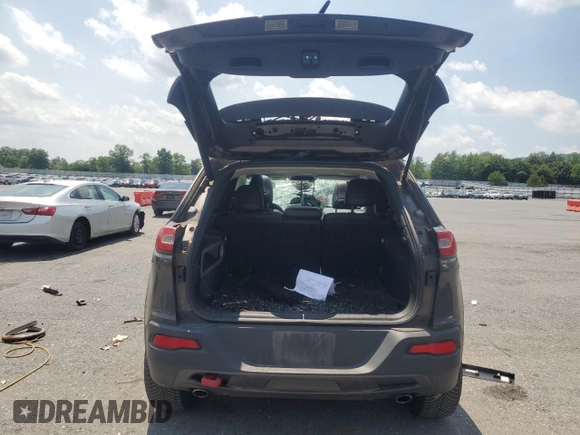 2017 Jeep Cherokee Trailhawk with VIN 1C4PJMBS2HW524373, listed as a Copart auction lot 62162765 with 67,429 mi miles and Salvage title. Bid and sale history available at DreamBid. Image 6.