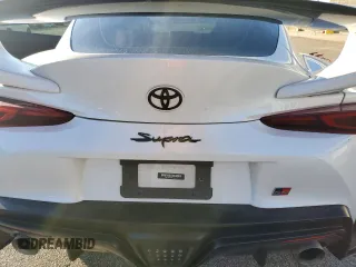 2021 Toyota Supra 3.0 z VIN WZ1DB0C08MW045912, wystawiony jako Copart lot #49248065 z przebiegiem Nie podano mil oraz Nie do naprawy • Non repairable. Historia ofert i sprzedaży dostępna na DreamBid. Obrazek 11.