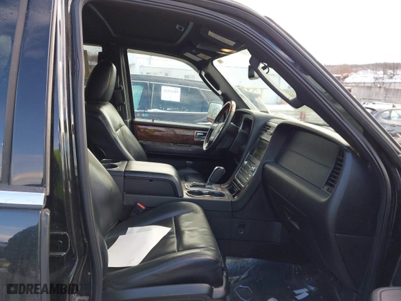 2015 Lincoln Navigator with VIN 5LMJJ2JT1FEJ03101, listed as a IAAI auction lot 41158169 with 159,249 mi miles. Bid and sale history available at carsss.com. Image 5.