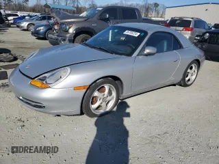 1999 Porsche 911 with VIN WP0CA299XXS650427, listed as a Copart auction lot 86705224 with Not Provided miles and Salvage Title. Bid and sale history available at DreamBid. Image 1.