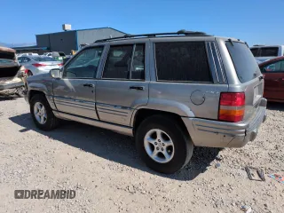 1998 Jeep Grand Cherokee Limited z VIN 1J4GZ88Z8WC306919, wystawiony jako Copart lot #61505725 z przebiegiem 195 329 mil mil oraz Czysty tytuł • Clean title. Historia ofert i sprzedaży dostępna na DreamBid. Obrazek 2.